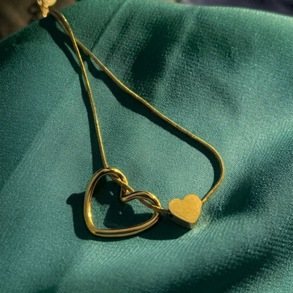 Dual-Heart Embrace Pendant
