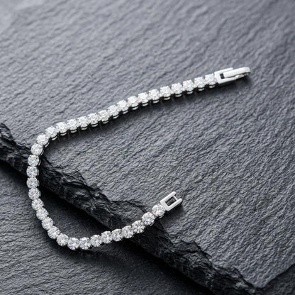 Diamond bracelet on a dark stone surface