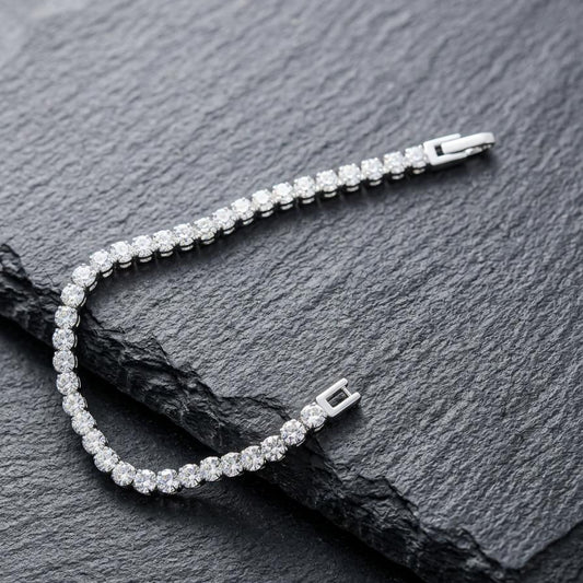 Diamond bracelet on a dark stone surface